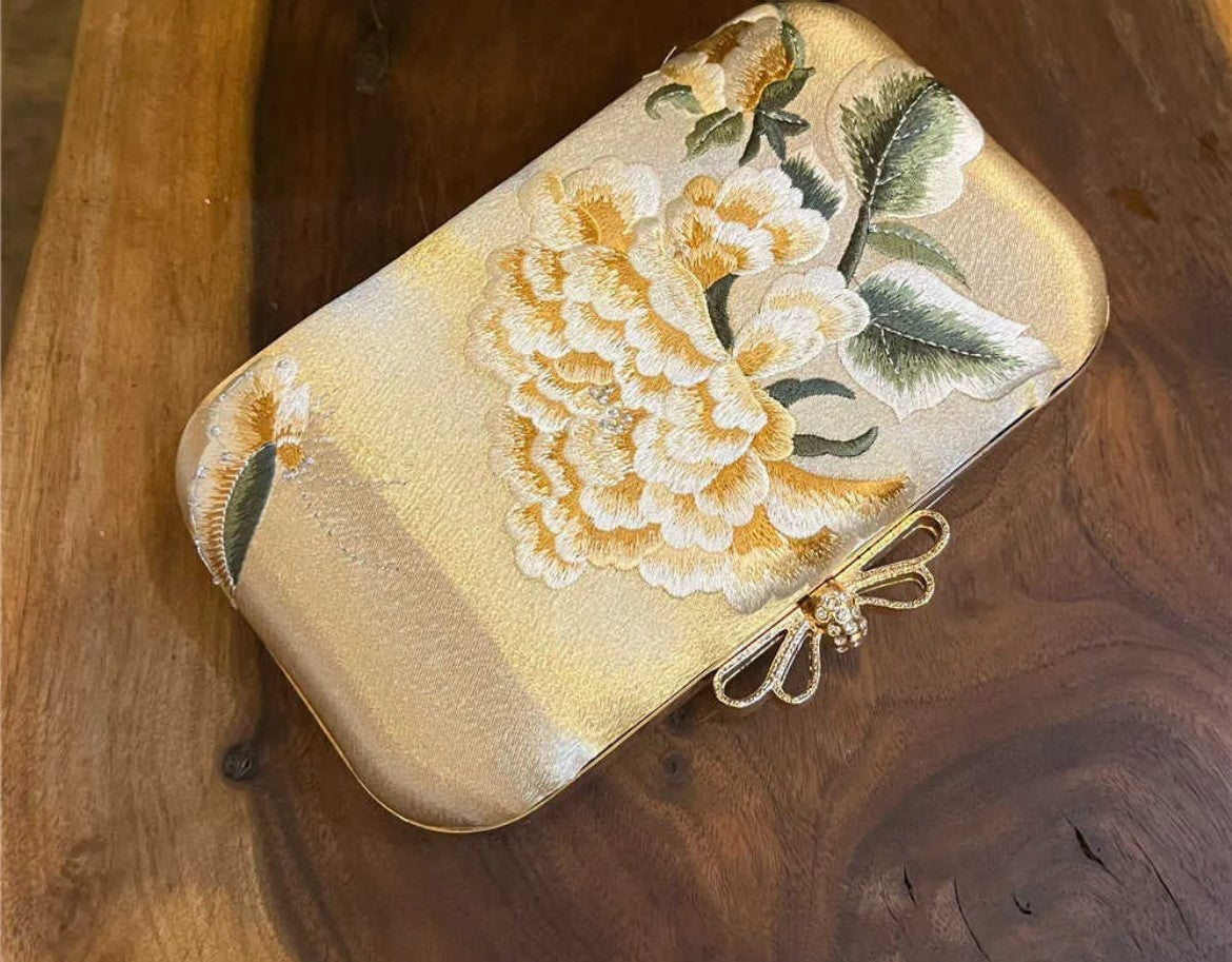 Perrands Silk floral hard clutch